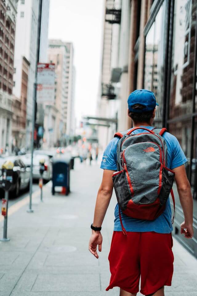 Person with backpack walking